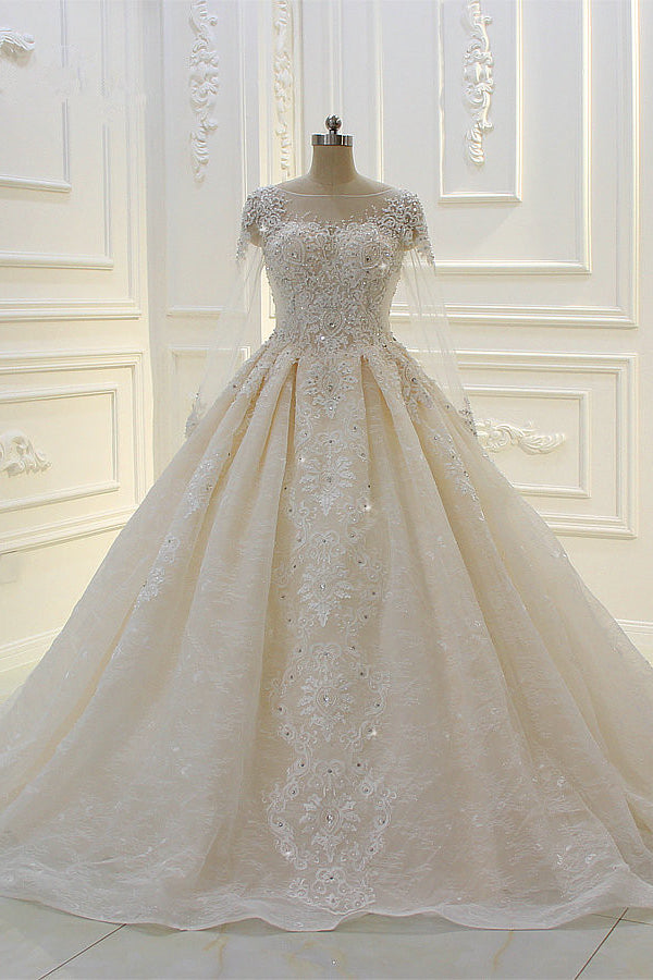 Langärmliges, perlenbesetztes Ballkleid-Brautkleid von Bateau mit Spitzenapplikationen
