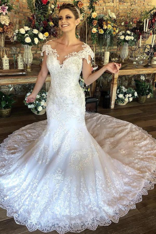 Bezauberndes, langes, herzförmiges Brautkleid im Meerjungfrau-Stil mit Flügelärmeln und Spitze