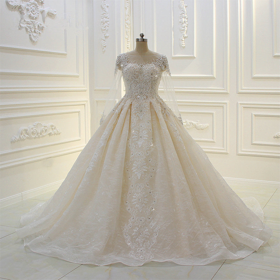 Langärmliges, perlenbesetztes Ballkleid-Brautkleid von Bateau mit Spitzenapplikationen