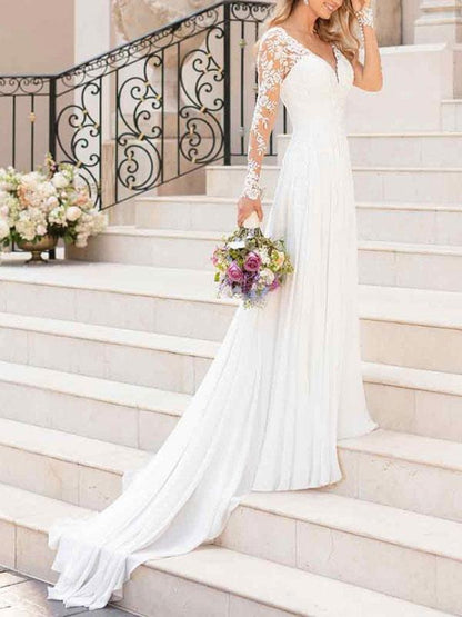 Langärmliges Brautkleid aus Spitze und Tüll