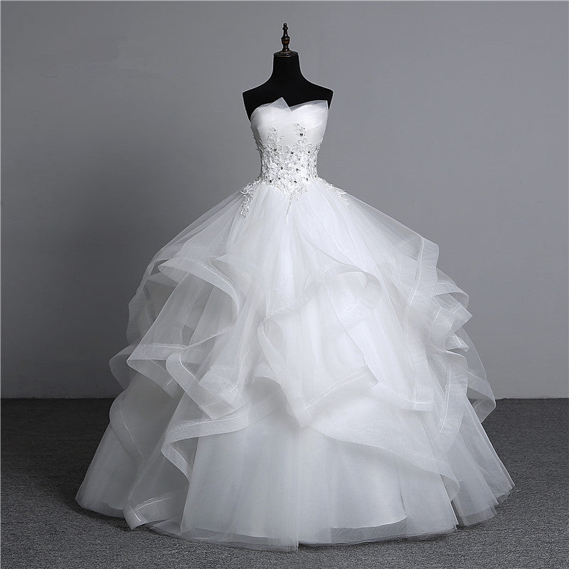Langes trägerloses Ballkleid-Brautkleid mit Perlenverzierung