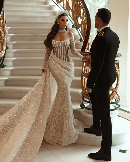 Champagner-Pailletten-Brautkleid mit langen Ärmeln und Meerjungfrau-Plissee