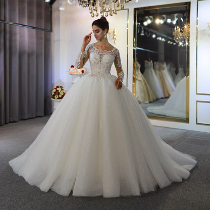 Wunderschönes Bateau-Brautkleid in A-Linie mit langen Ärmeln und Applikationen aus Spitze und Pailletten