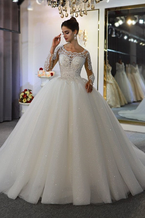 Wunderschönes Bateau-Brautkleid in A-Linie mit langen Ärmeln und Applikationen aus Spitze und Pailletten