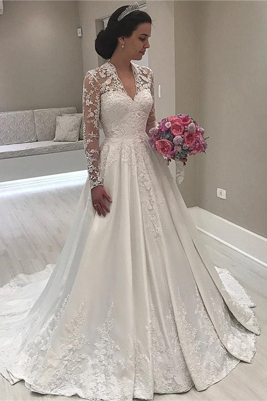 Herzförmiges, langärmliges Meerjungfrau-Brautkleid mit Spitzenapplikationen