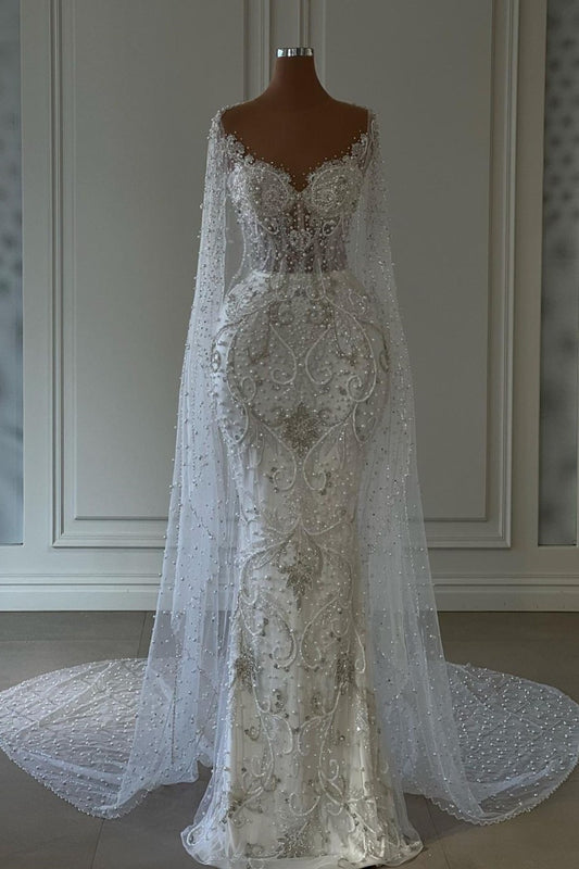 Ovlias Weißes Brautkleid mit langen Ärmeln und Perlenverzierung aus Tüll