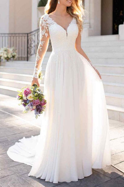 Langärmliges Brautkleid aus Spitze und Tüll