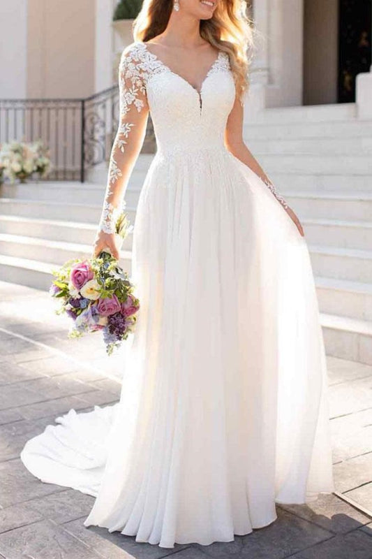 Langärmliges Brautkleid aus Spitze und Tüll