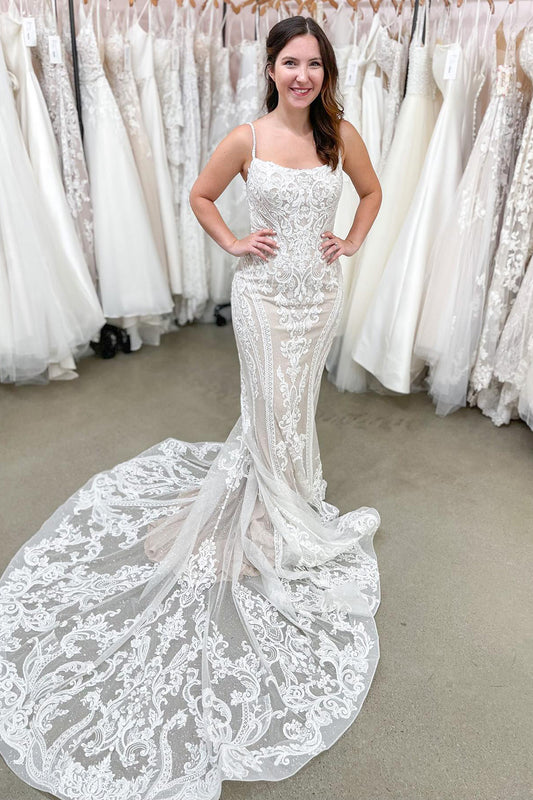 Wunderschönes rückenfreies Meerjungfrau-Brautkleid mit Spaghettiträgern und Spitzenapplikationen