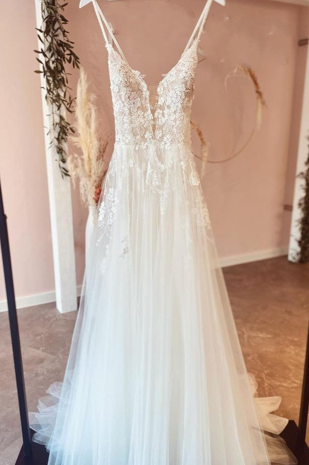 Wunderschönes, langes, rückenfreies Brautkleid in A-Linie aus Tüll mit Spitzenapplikationen
