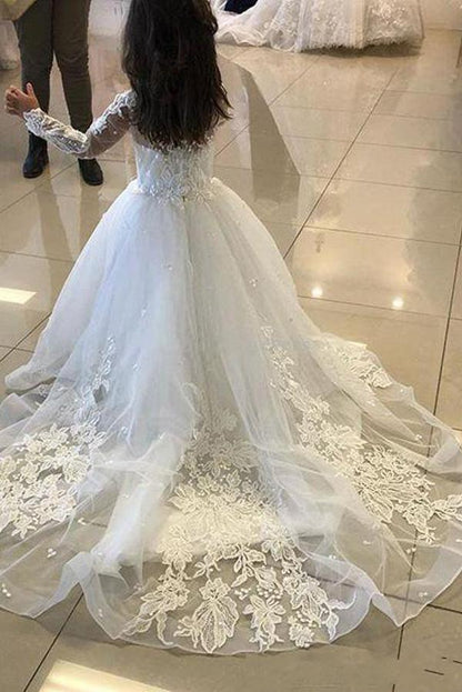 Bestellen Sie Blumenmädchenkleider mit Ärmel bei babyonlinedress.de. Blumenkinderkleider Mit Spitze für sie zur hochzeit gehen.