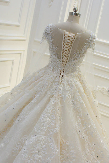 Langärmliges, perlenbesetztes Ballkleid-Brautkleid von Bateau mit Spitzenapplikationen