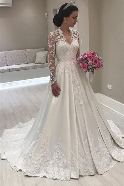 Herzförmiges, langärmliges Meerjungfrau-Brautkleid mit Spitzenapplikationen